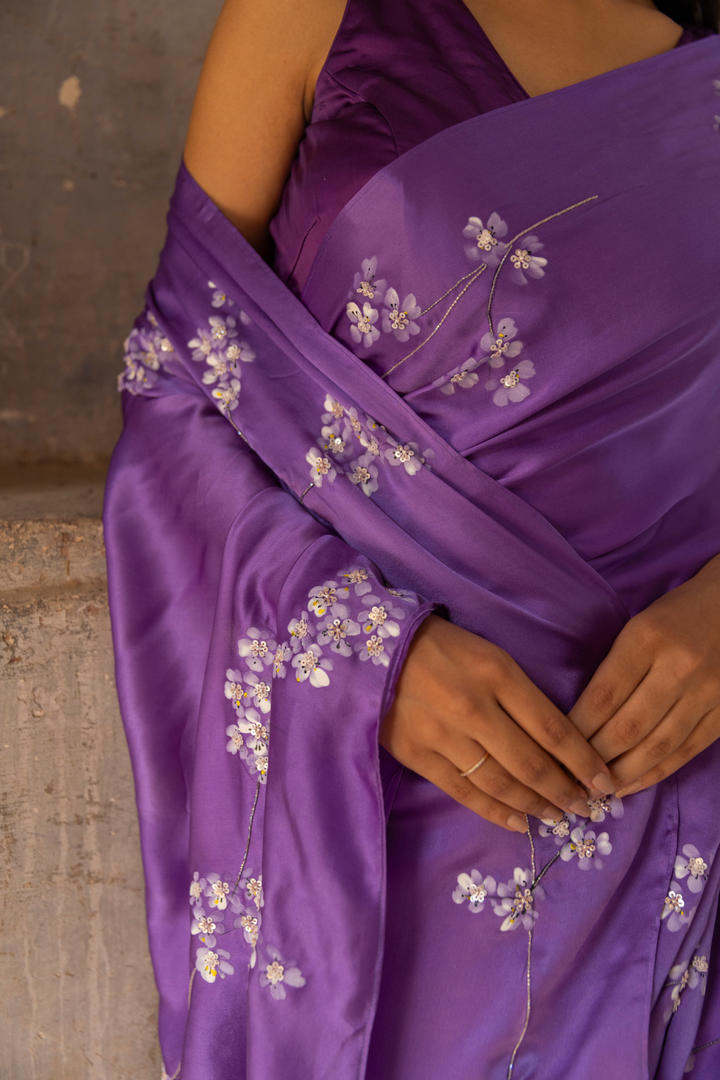 Handpainted pure silk satin saree hand embroidered with pearl sequins and cutdana work