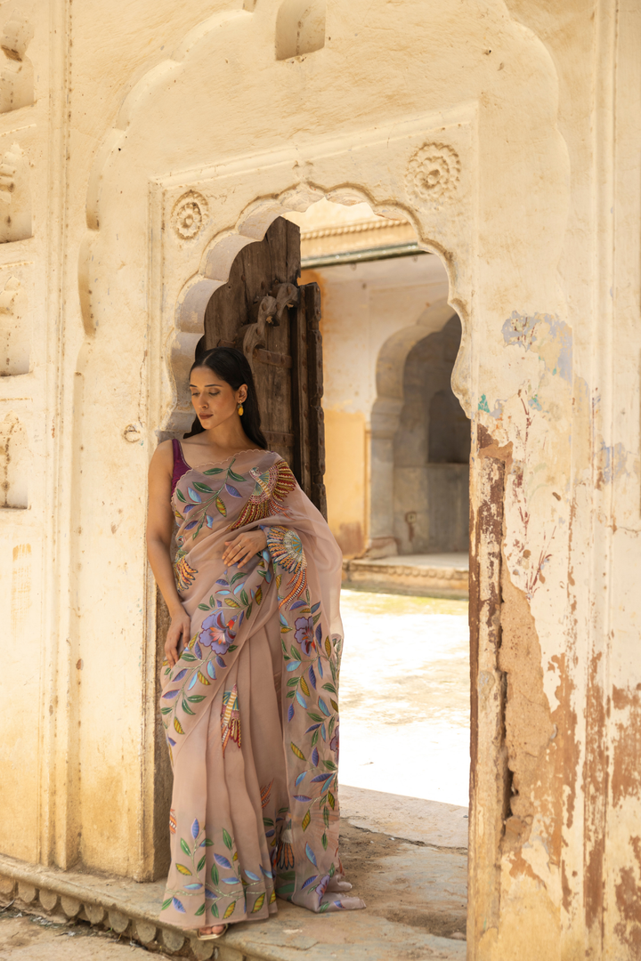 Handpainted pure organza silk saree hand embroidered with pearl beads work