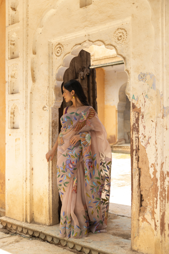 Handpainted pure organza silk saree hand embroidered with pearl beads work