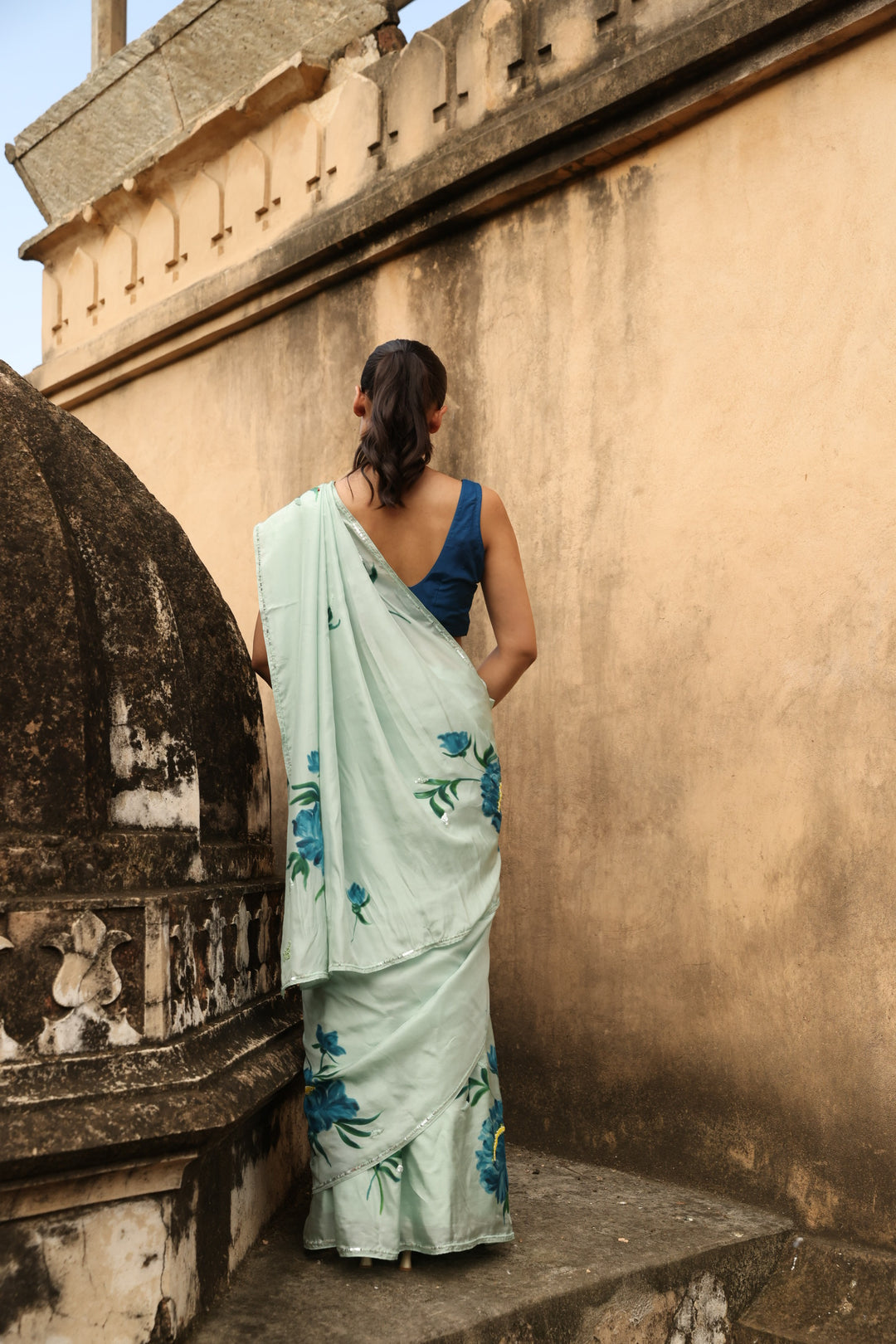 Handpainted a pure silk saree hand embroidered with colorful beads