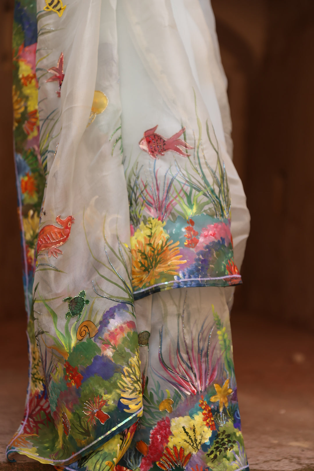 Grey printed Handpainted and hand embroidered organza silk saree